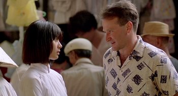 Movie still from “Good Morning, Vietnam” (1987), directed by Barry Levinson – A man and a woman talking to each other; Close Up shot, Over the shoulder angle