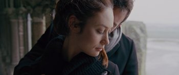 Movie still from “To the Wonder” (2012), directed by Terrence Malick – A person with her eyes closed; Close Up shot, Over the shoulder angle