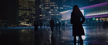 Movie still from “To the Wonder” (2012), directed by Terrence Malick – A group of people walking in the rain at night; Wide shot, Low angle