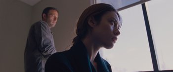 Movie still from “To the Wonder” (2012), directed by Terrence Malick – A woman with long red hair looking out of a window; Close Up shot, Low angle