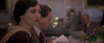 Movie still from “Gosford Park” (2001), directed by Robert Altman – A man and a woman sitting next to each other; Close Up shot, Low angle