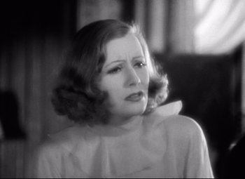 Movie still from “Grand Hotel” (1932), directed by Edmund Goulding – An old black and white photo of a woman; Close Up shot, High angle