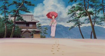 Movie still from “Grave of the Fireflies” (1988), directed by Isao Takahata – An animated woman holding an umbrella in the middle of the desert; Extreme Wide shot, Low angle