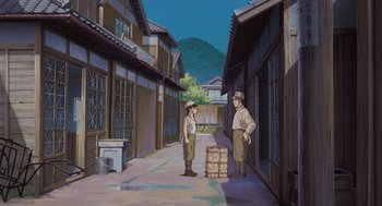 Movie still from “Grave of the Fireflies” (1988), directed by Isao Takahata – A painting of two men standing on a street; Wide shot, High angle