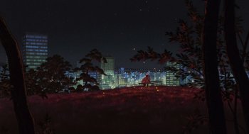 Movie still from “Grave of the Fireflies” (1988), directed by Isao Takahata – A person sitting on a hill at night with a city in the background; Extreme Wide shot, Low angle