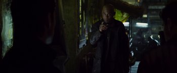 Movie still from “Total Recall” (2012), directed by Len Wiseman – Medium shot, Over the shoulder angle