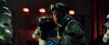 Movie still from “Total Recall” (2012), directed by Len Wiseman – Medium shot, Over the shoulder angle