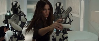 Movie still from “Total Recall” (2012), directed by Len Wiseman – Medium shot, Low angle