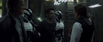 Movie still from “Total Recall” (2012), directed by Len Wiseman – Medium shot, Over the shoulder angle