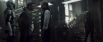 Movie still from “Total Recall” (2012), directed by Len Wiseman – Medium shot, Over the shoulder angle