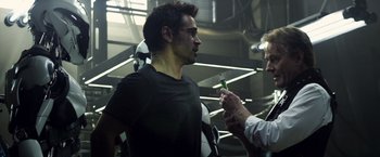 Movie still from “Total Recall” (2012), directed by Len Wiseman – Medium shot, Over the shoulder angle