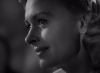 Movie still from “Green Dolphin Street” (1947), directed by Victor Saville – A woman's face in black - and - white; Close Up shot, Over the shoulder angle