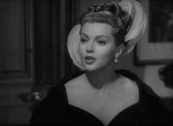 Movie still from “Green Dolphin Street” (1947), directed by Victor Saville – A black and white photo of a woman in a black dress; Close Up shot, Over the shoulder angle