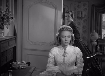 Movie still from “Green Dolphin Street” (1947), directed by Victor Saville – Two women are sitting in front of a mirror; Medium shot, Over the shoulder angle