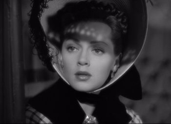 Movie still from “Green Dolphin Street” (1947), directed by Victor Saville – A black - and - white photo of a woman in a hat; Close Up shot, High angle