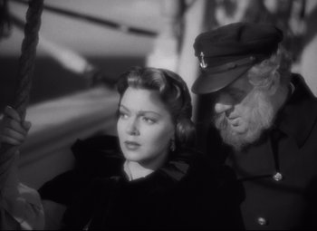 Movie still from “Green Dolphin Street” (1947), directed by Victor Saville – An old black and white photo of a man and a woman; Close Up shot, Over the shoulder angle