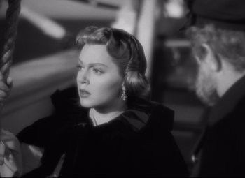 Movie still from “Green Dolphin Street” (1947), directed by Victor Saville – An old black and white photo of a woman; Close Up shot, Over the shoulder angle