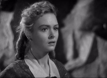 Movie still from “Green Dolphin Street” (1947), directed by Victor Saville – A black - and - white photo of a woman in a dress; Close Up shot, Over the shoulder angle