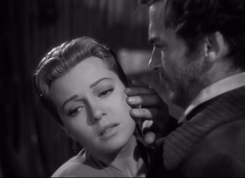 Movie still from “Green Dolphin Street” (1947), directed by Victor Saville – A man touching the ear of a beautiful woman; Close Up shot, Over the shoulder angle