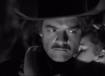 Movie still from “Green Dolphin Street” (1947), directed by Victor Saville – A person wearing a cowboy hat; Close Up shot, Over the shoulder angle