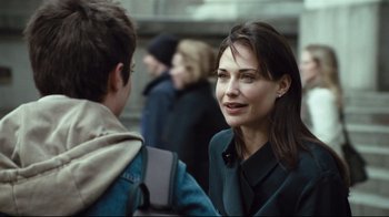 Movie still from “Green Street Hooligans” (2005), directed by Lexi Alexander – A woman talking to a boy; Close Up shot, Over the shoulder angle
