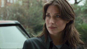 Movie still from “Green Street Hooligans” (2005), directed by Lexi Alexander – A person wearing a black shirt; Close Up shot, Over the shoulder angle