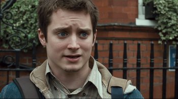 Movie still from “Green Street Hooligans” (2005), directed by Lexi Alexander – A person wearing a jacket; Close Up shot, Over the shoulder angle