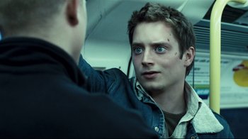 Movie still from “Green Street Hooligans” (2005), directed by Lexi Alexander – A young man looking at another young man in the mirror; Close Up shot, Over the shoulder angle