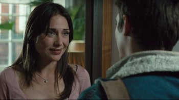 Movie still from “Green Street Hooligans” (2005), directed by Lexi Alexander – A woman is talking to a man in front of a window; Close Up shot, Over the shoulder angle