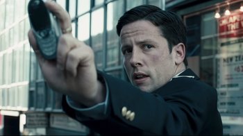 Movie still from “Green Street Hooligans” (2005), directed by Lexi Alexander – A person holding a cell phone; Close Up shot, Low angle