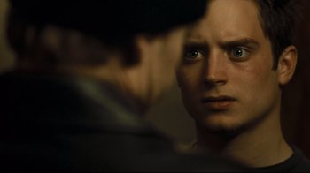 Movie still from “Green Street Hooligans” (2005), directed by Lexi Alexander – A man's face in a mirror; Close Up shot, Over the shoulder angle