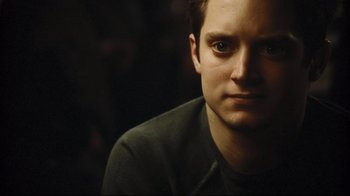 Movie still from “Green Street Hooligans” (2005), directed by Lexi Alexander – A person wearing a black shirt; Close Up shot, Over the shoulder angle