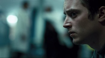 Movie still from “Green Street Hooligans” (2005), directed by Lexi Alexander – A man's face in a dark room; Close Up shot, Low angle