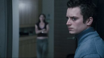 Movie still from “Green Street Hooligans” (2005), directed by Lexi Alexander – A man and a woman standing in front of a mirror; Close Up shot, Over the shoulder angle