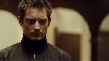 Movie still from “Green Street Hooligans” (2005), directed by Lexi Alexander – A person wearing a jacket; Close Up shot, Low angle