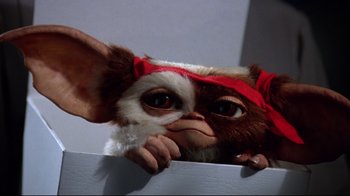 Movie still from “Gremlins 2: The New Batch” (1990), directed by Joe Dante – A stuffed toy of a gizmo; Close Up shot, Low angle