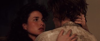 Movie still from “Greystoke: The Legend of Tarzan, Lord of the Apes” (1984), directed by Hugh Hudson – A man and a woman are looking at each other; Close Up shot, Over the shoulder angle