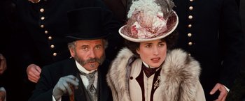 Movie still from “Greystoke: The Legend of Tarzan, Lord of the Apes” (1984), directed by Hugh Hudson – A man and a woman dressed in victorian clothing; Close Up shot, Low angle