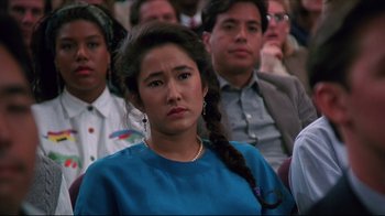 Movie still from “Gross Anatomy” (1989), directed by Thom Eberhardt – A group of people sitting in front of each other; Close Up shot, High angle