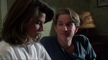 Movie still from “Gross Anatomy” (1989), directed by Thom Eberhardt – A man and a woman looking at each other; Close Up shot, Over the shoulder angle