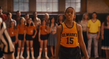 Movie still from “Grown Ups” (2010), directed by Dennis Dugan – A group of people standing in front of a basketball court; Medium shot, Over the shoulder angle