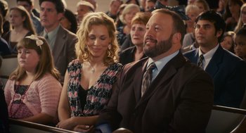 Movie still from “Grown Ups” (2010), directed by Dennis Dugan – A man and a woman are standing in front of a group of people; Medium shot, Over the shoulder angle