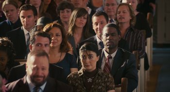 Movie still from “Grown Ups” (2010), directed by Dennis Dugan – A group of people sitting in a room together; Medium shot, Over the shoulder angle
