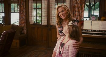 Movie still from “Grown Ups” (2010), directed by Dennis Dugan – A woman and a little girl standing next to each other; Medium shot, Over the shoulder angle