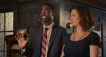 Movie still from “Grown Ups” (2010), directed by Dennis Dugan – A man and a woman standing next to each other; Medium shot, Over the shoulder angle