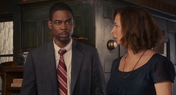 Movie still from “Grown Ups” (2010), directed by Dennis Dugan – A man and a woman standing next to each other; Medium shot, Over the shoulder angle