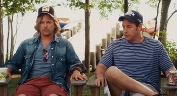 Movie still from “Grown Ups” (2010), directed by Dennis Dugan – Two men sitting on a bench next to a body of water; Medium shot, Over the shoulder angle