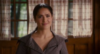 Movie still from “Grown Ups” (2010), directed by Dennis Dugan – Salma hayek smiling for the camera; Close Up shot, Over the shoulder angle