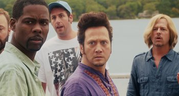 Movie still from “Grown Ups” (2010), directed by Dennis Dugan – A group of men standing next to each other near a body of water; Close Up shot, Over the shoulder angle