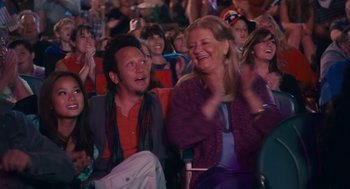 Movie still from “Grown Ups” (2010), directed by Dennis Dugan – A group of people sitting in a room; Medium shot, Over the shoulder angle